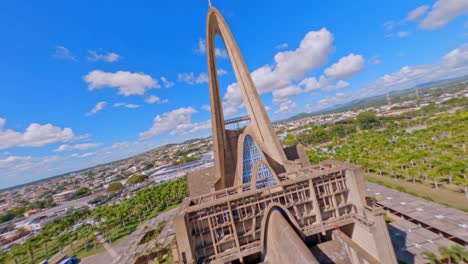 Exterior-of-Basilica-Nuestra-Señora-De-La-Altagracia-and-Surroundings-in-Higüey,-Dominican-Republic---aerial-FPV