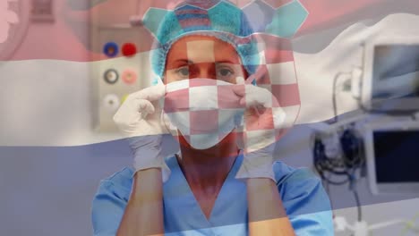 Animation-of-flag-of-croatia-waving-over-surgeon-in-face-masks