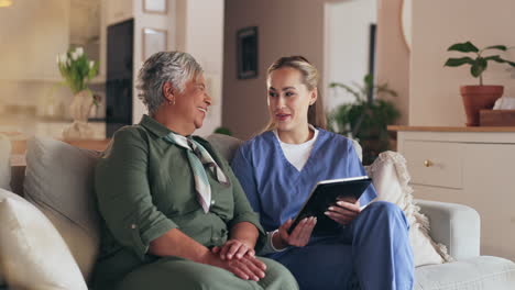 nurse and elderly patient at home