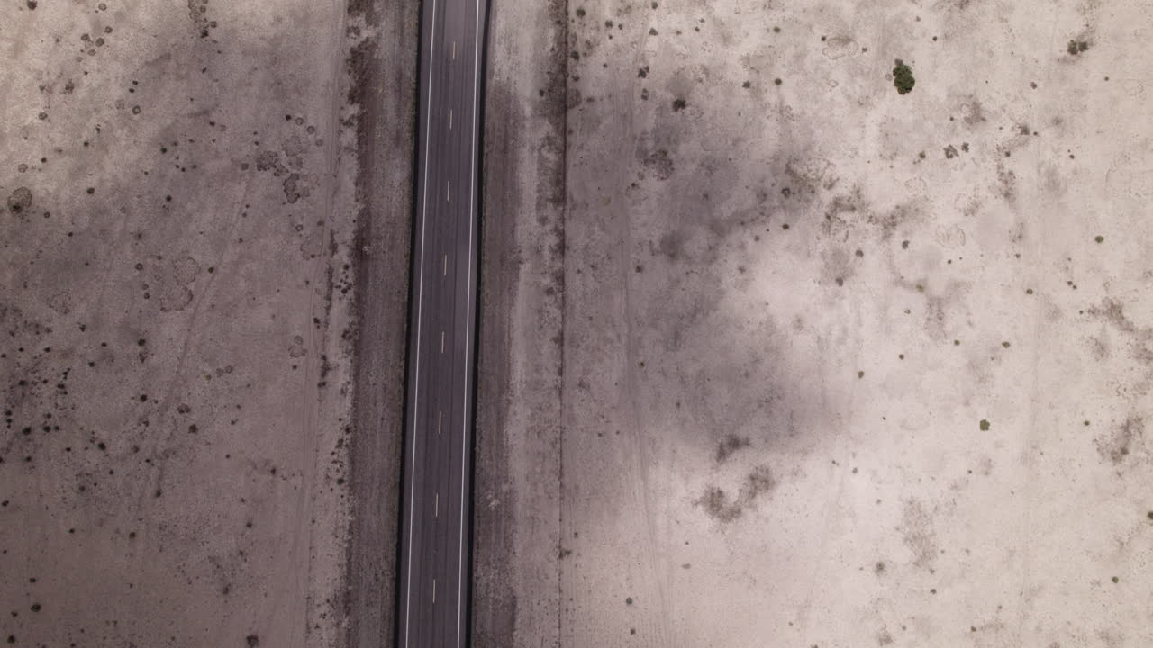 An empty stretch of desert highway in west Texas near Big Bend, aerial view