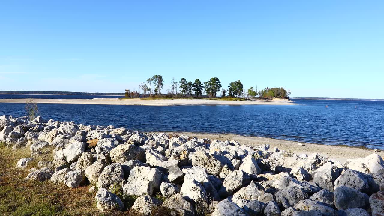 Static video of an island on San Rayburn Lake in Texas. Camera shot is a longshot showing the island off in the distance