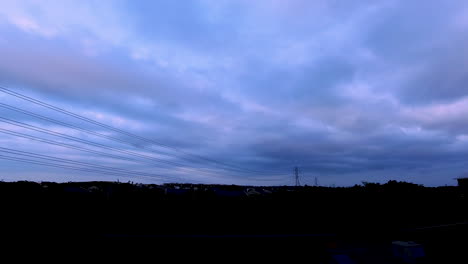 San-Antonio-Sunset-from-Apartment-Patio-with-Power-Lines-running-through-the-frame