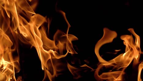 Flames-of-fire-on-black-background-in-slow-motion