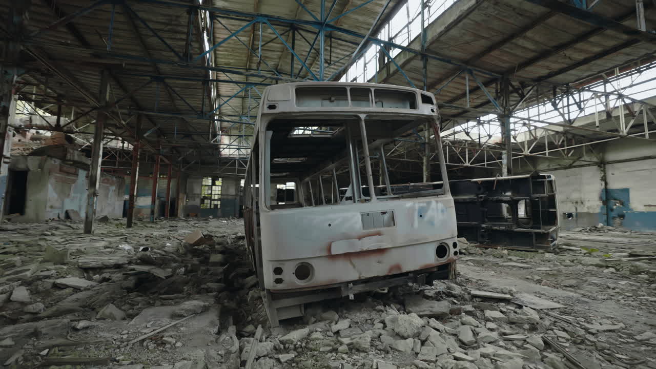 Abandoned Bus in a Ruined Factory