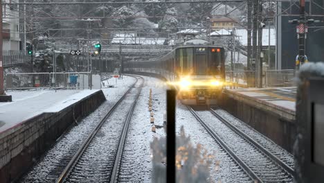 Biwako-Line-trains-in-Japan,-Bound-for-Kyoto-in-Winter-Snow