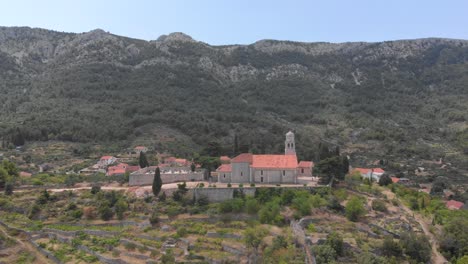 Aerial-Hyper-Lapse-Approaching-Historic-Church-Building-landmark-in-Croatia