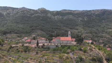 aerial hyper lapse approaching historic church building landmark in croatia