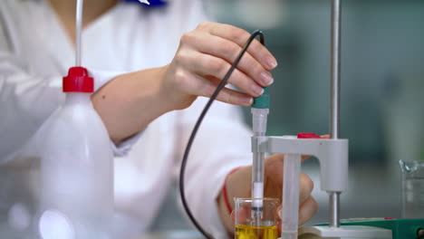 scientist hands working with laboratory equipment