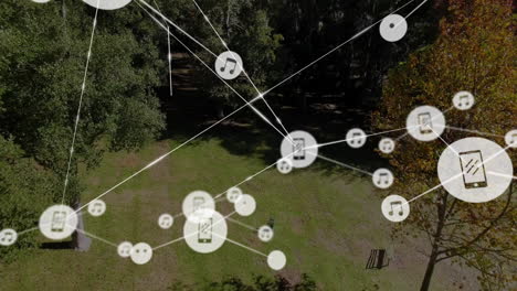 network of connected devices and data sharing animation over forest landscape