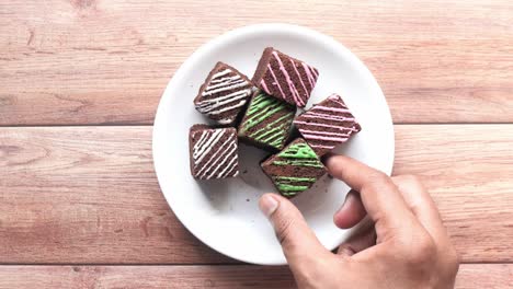 colorful square brownies on a plate