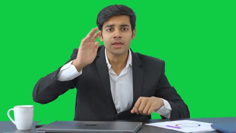 Indian-businessman-motivating-employees-in-a-meeting-Green-screen