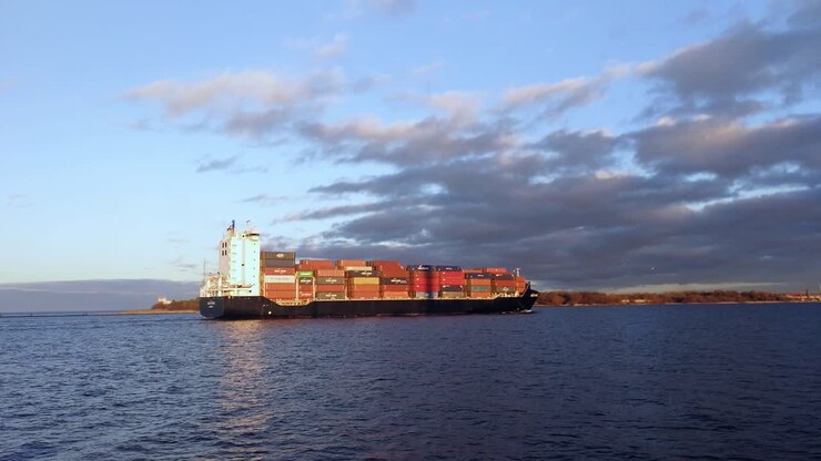 Ship slowly comming into the port and passing by