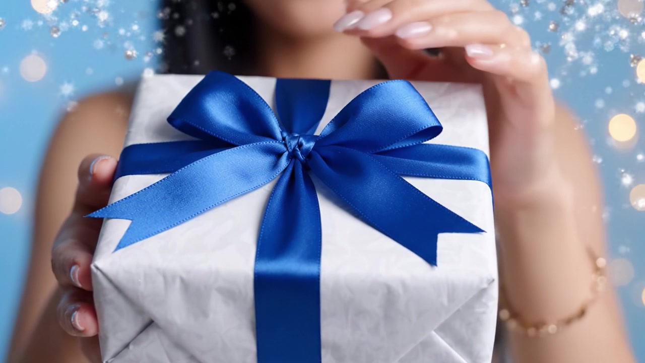 Un regalo splendidamente confezionato con un vivace nastro blu viene presentato, catturando la gioia e l'emozione della celebrazione e del donare in un momento pieno di scintillii e meraviglia