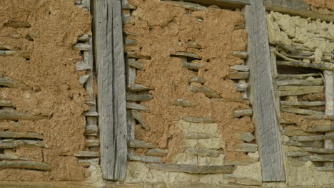 Old-architecture-wattle-and-daub-timber-framed-house-mud-and-sticks-close-up