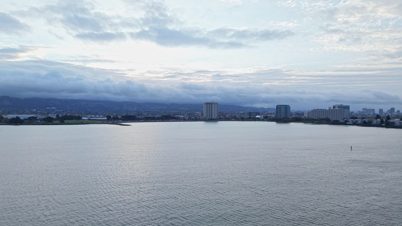 A wide angle drone view of the shoreline in Emeryville California. Shot in 4K.