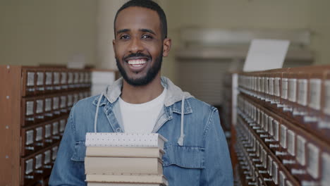 smiling student in a library