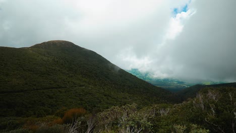 Captivating-aerial-view-of-mist-shrouded-valley-in-scenic-New-Zealand