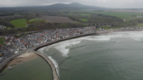 aerial views of the scottish small town of cullen with harbour and viaduct