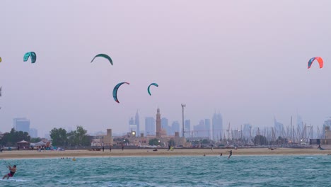 fazza beach dubai - kite surfers enjoy good winds and calm seas