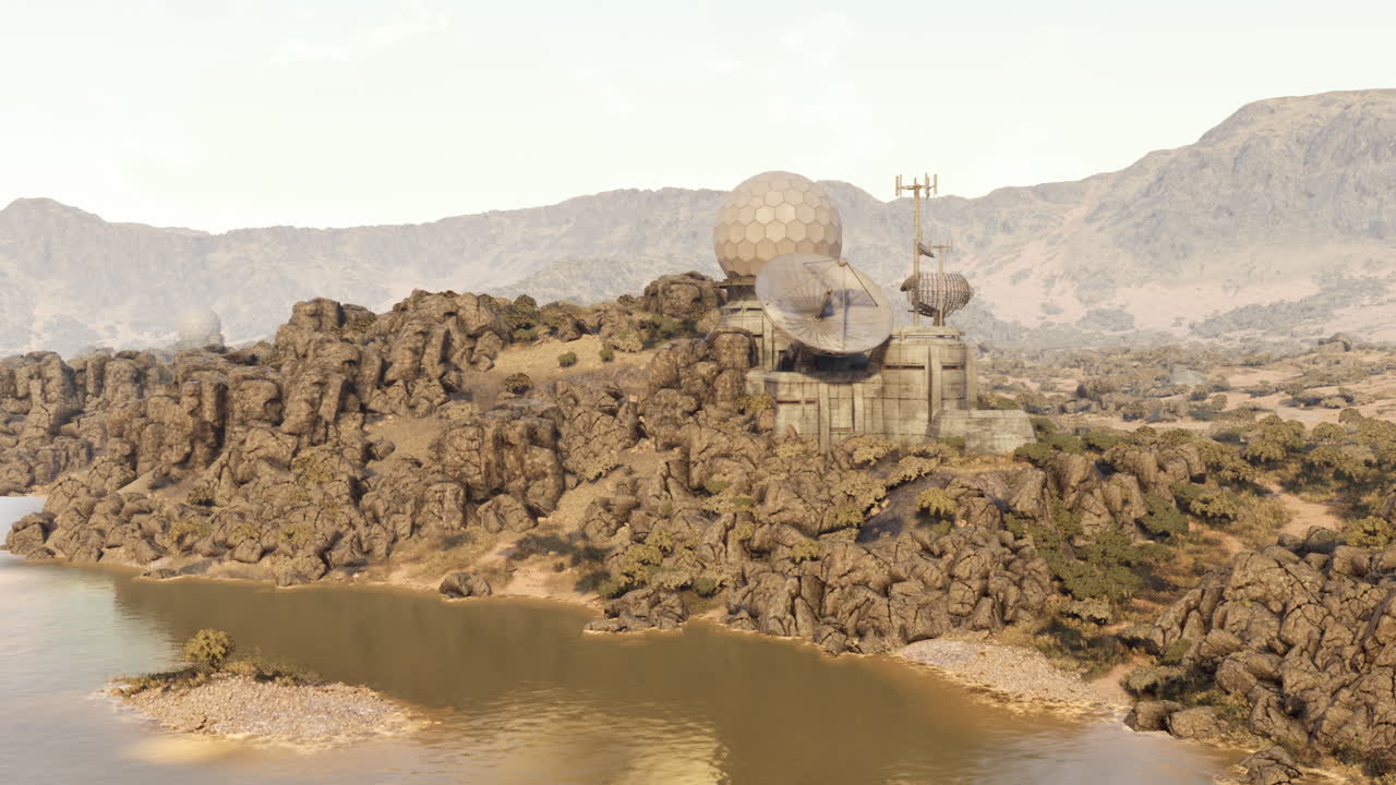 Observation station placed on rocky terrain near a calm lake during daylight