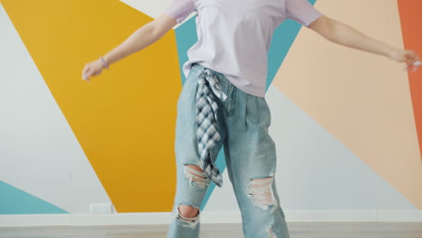woman dancing in stylish denim outfit