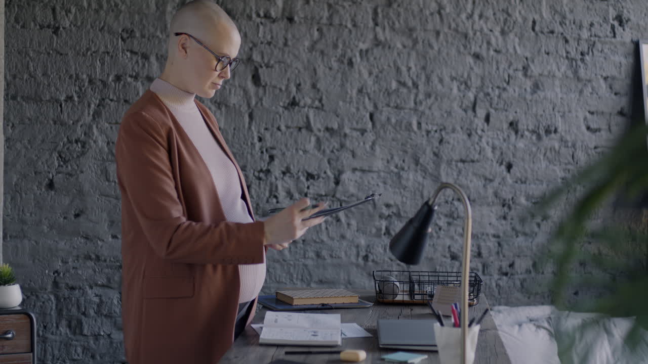 Pregnant Businesswoman Working at Home