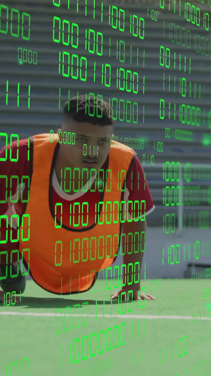 Vertical video: Male athlete pushing up on drill cue, green binary overlay tracking sports metrics