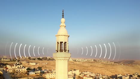 minarete de una mezquita con ondas de sonido