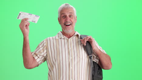 senior man holding a boarding pass on green screen