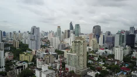 The Beautiful and Peaceful Scenery in Bangkok, Thailand Composed Of Glorious Trees and Unique Buildings - Aerial Shot