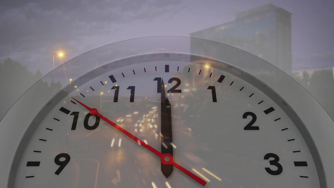 Translucent clock overlaying urban road, dusk falling, red hand sweeping to twelve, showing time