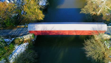 ariel view of a covered bridge in lancaster county pennsylvania as seen by a drone