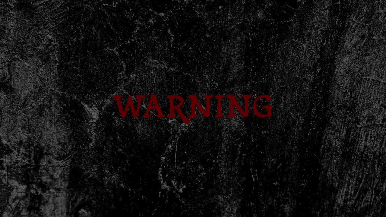 Flickering Red Warning Text on Dark Grunge Background