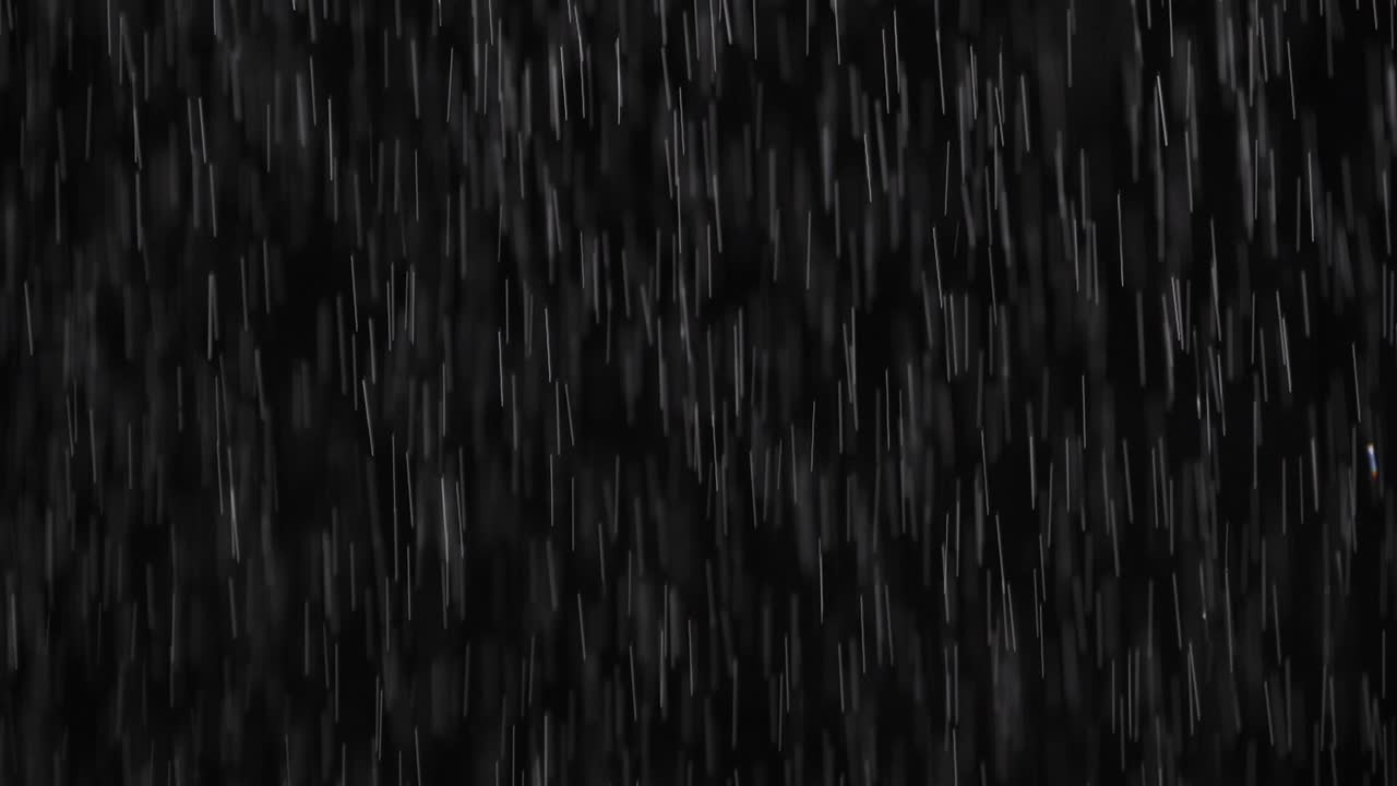 Blur abstract scene of falling raindrop isolated on black background