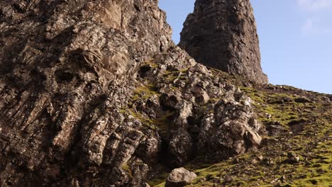 giant rock pillars on the hike towards old man of storr isle of skye, highlands of scotland