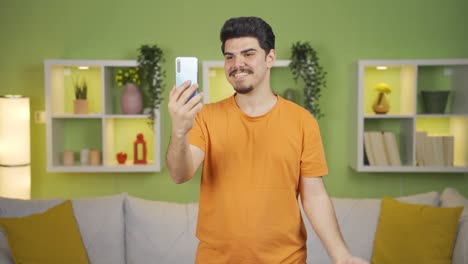 Young-man-chatting-facetime-with-his-friends.