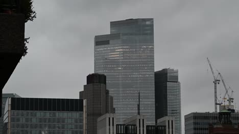 a grey view from the barbican centre to the city of london, united kingdom