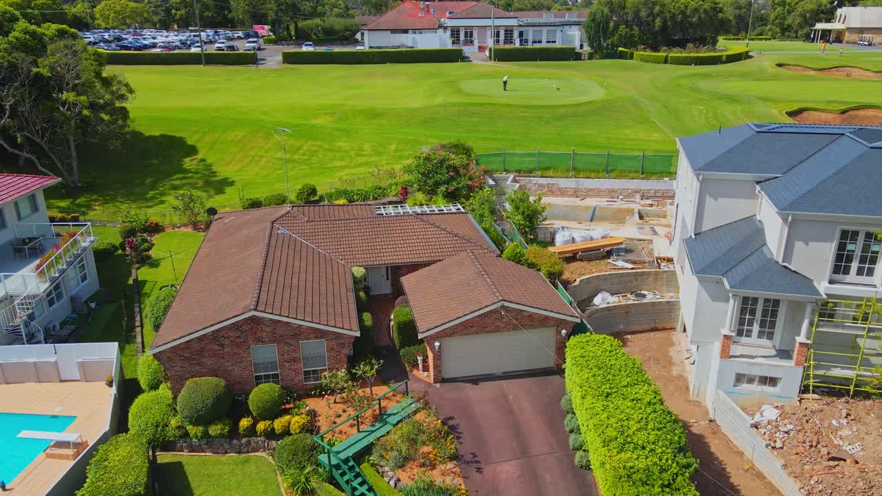 Drone shot of houses and golf course in Sydney Australia-1