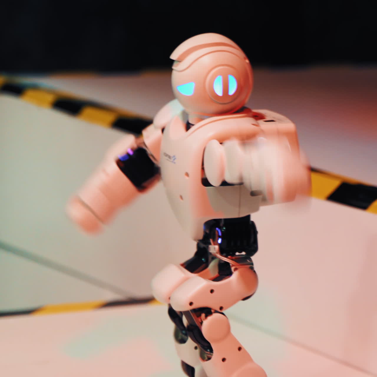 Dancing robot close up. Smart technology concept. Closeup of smart robots dance. Robotic dance party. Dancing robot humanoid. Dancer robot man