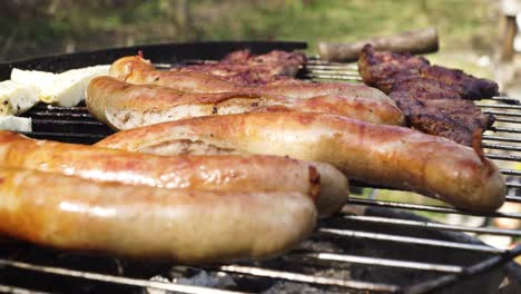 Traditional-German-Sausages-grilled-Outside-Above-Charcoal-and-Fire