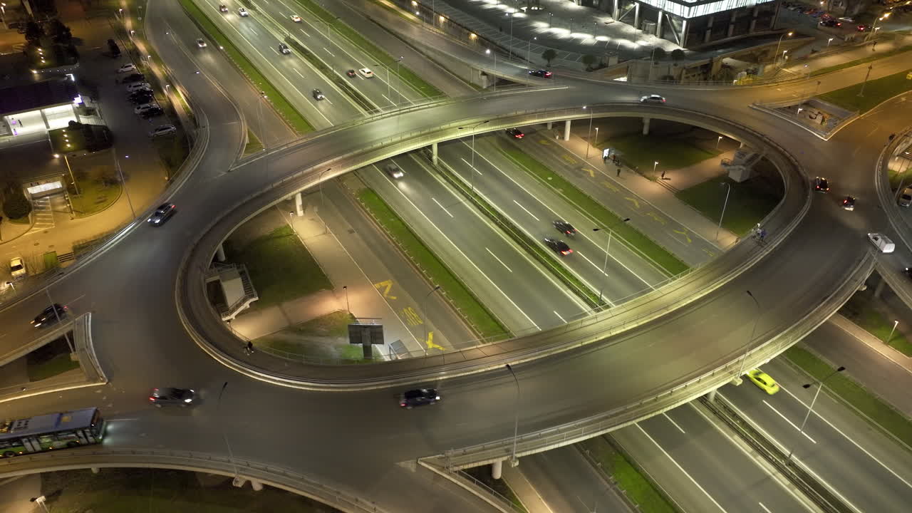 Aerial Night View of a Busy Highway Interchange