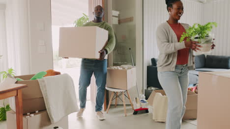 moving, box and happy with black couple at front