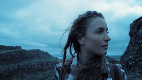 woman hiking in scottish highlands