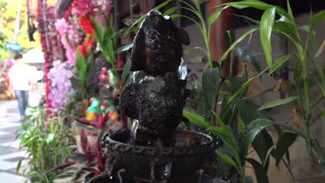 flowing outdoor fountain in chiang mai, thailand