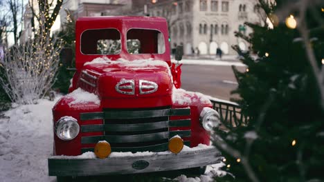 red truck with christmas tree at magnificent mile in chicago downtown