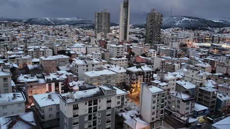 snowy urban landscape at dusk