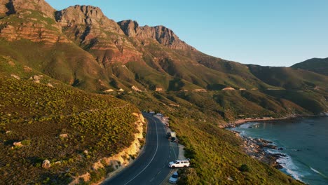 beautiful coastline of chapmans peak road at sunset, aerial