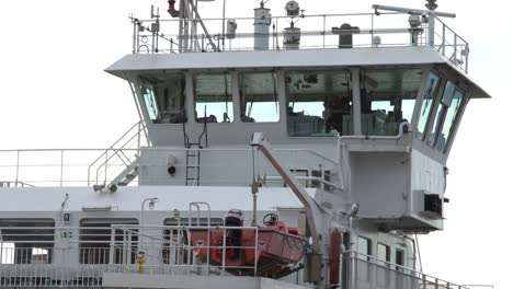 command bridge of a boat with moving antennas and flags