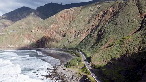 Aerial-drone-view-of-a-mountainous-coastline-in-Benjio,-Parque-Rural-de-Anaga,-Northern-Tenerife,-the-Canary-Islands