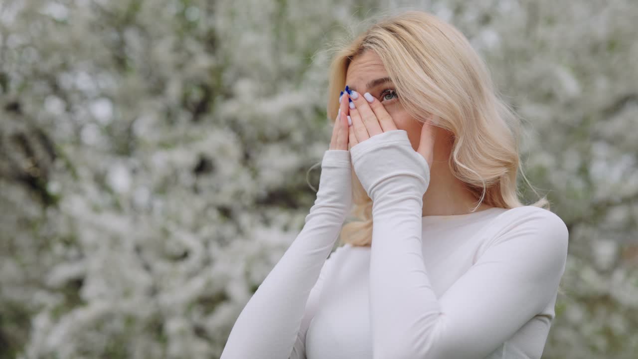 Woman in distress in a spring setting